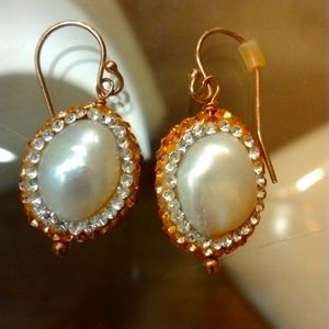 White pearl earrings.